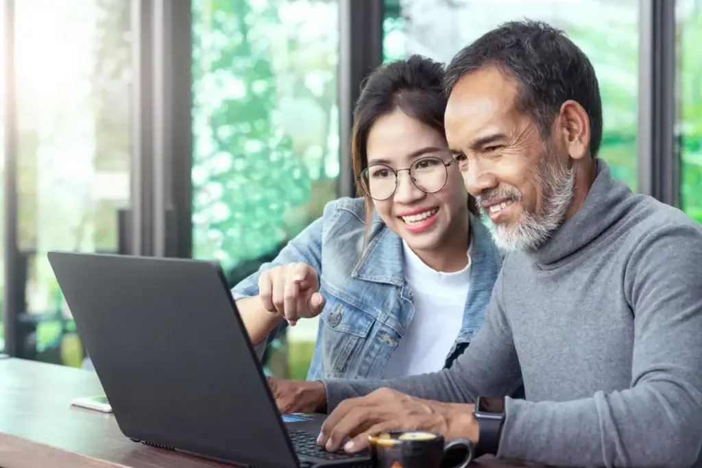 man woman schedule penile filler appointment on computer